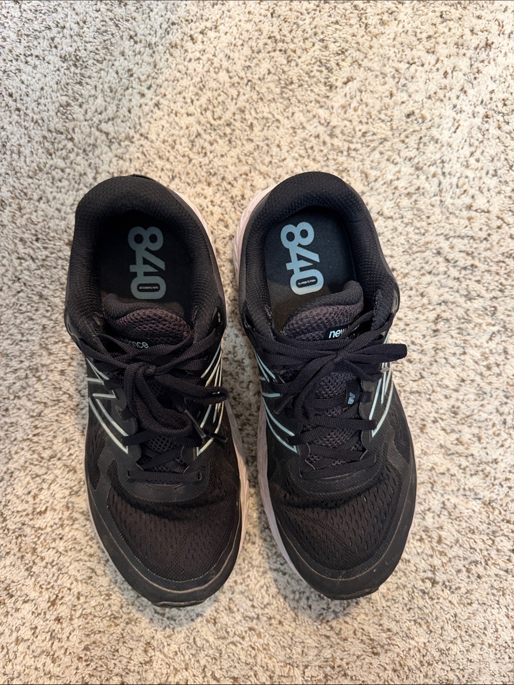New Balance Black Athletic Running Shoes with Light Silver Accents